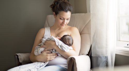 New mother breastfeeding her baby